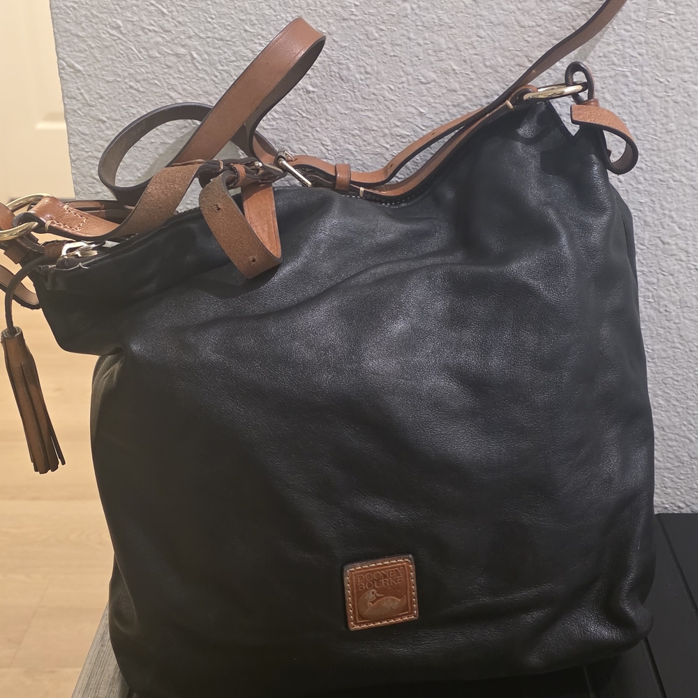 Dooney & Bourke Black Leather Bag with Brown Logo Patch